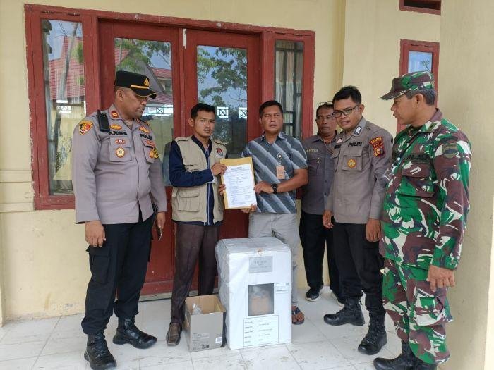 Polisi Kawal Ketat Logistik PSU di Bangko Pusako
