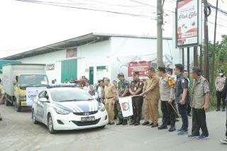 Pj Wali Kota Pekanbaru Lepas Distribusi Logistik Pemilu 2024 dari Gudang KPU