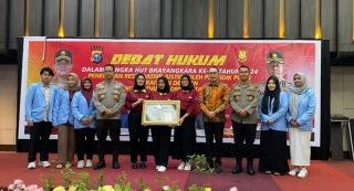 Universitas Riau Juara Lomba Debat Hukum Restorative Justice di HUT Bhayangkara