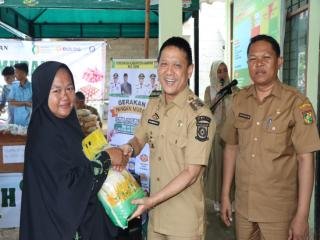 Tekan Angka Inflasi Daerah, Pj. Bupati Kampar Buka Gerakan Pangan Murah di Desa Silam