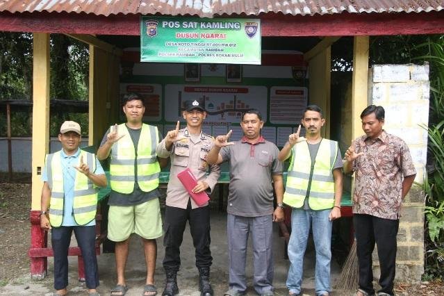 Bupati Anton Ajak Seluruh Desa di Rohul Contoh Bhabinkamtibmas Koto Tinggi dalam Penguatan Satkamling