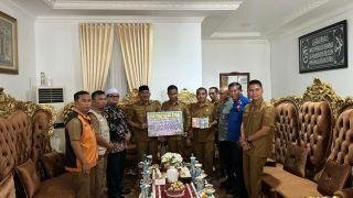 Pemkab Kampar Salurkan Bantuan Tunai Rp192 Juta ke Lima Puluh Kota